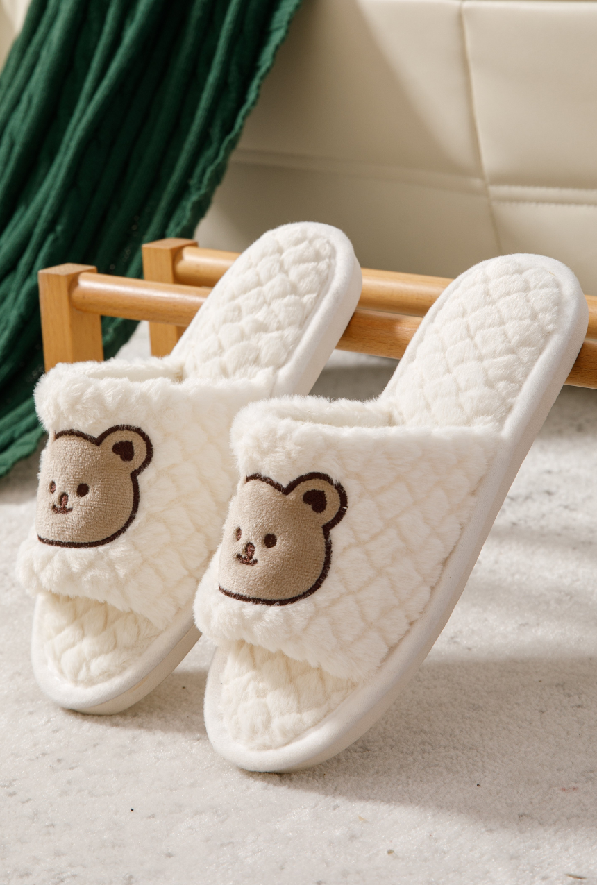 Set de pantuflas capitoneadas con osito bordado